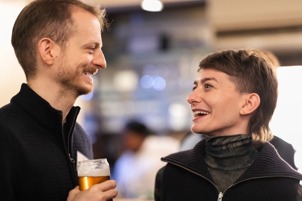 Man and woman smiling at each other